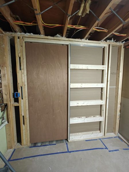 Shower area framed with plumbing roughed in
