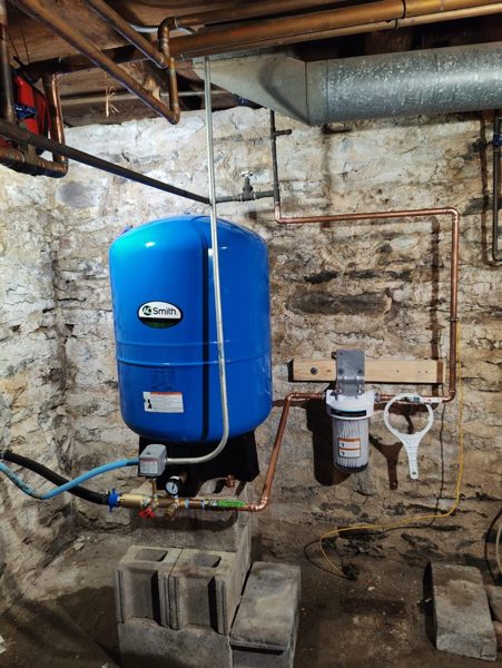 Well pressure tank and filter installation
